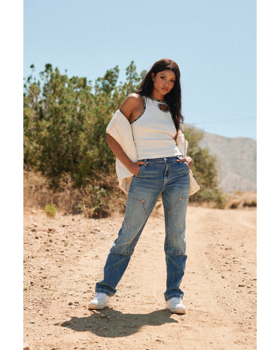 Woman wearing True Religion jeans in the desert